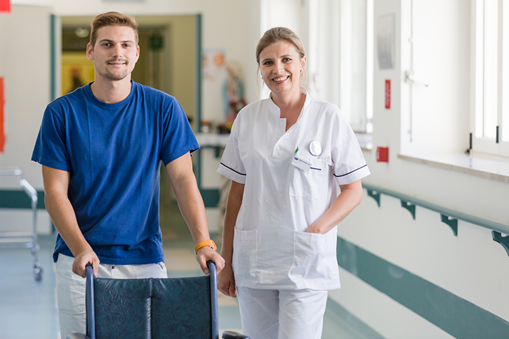 medical professionals in hopital hallway